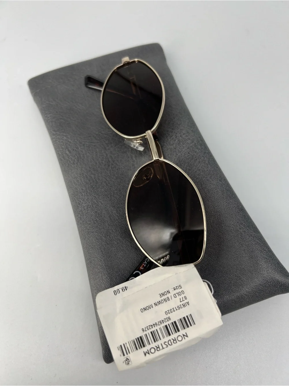 Aire women’s Round Metal Frame Sunglasses in Black